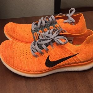 Orange Nike Free RN Flyknit